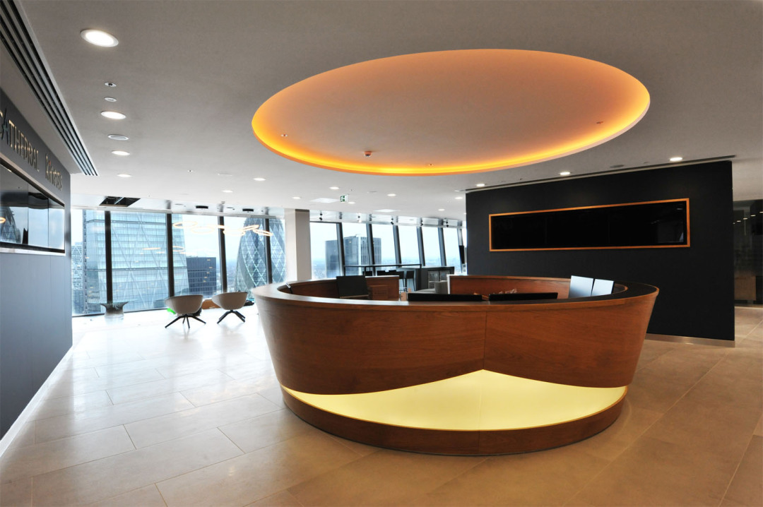 Walnut reception desk at Lancashire Insurance offices within Walkie Talkie building