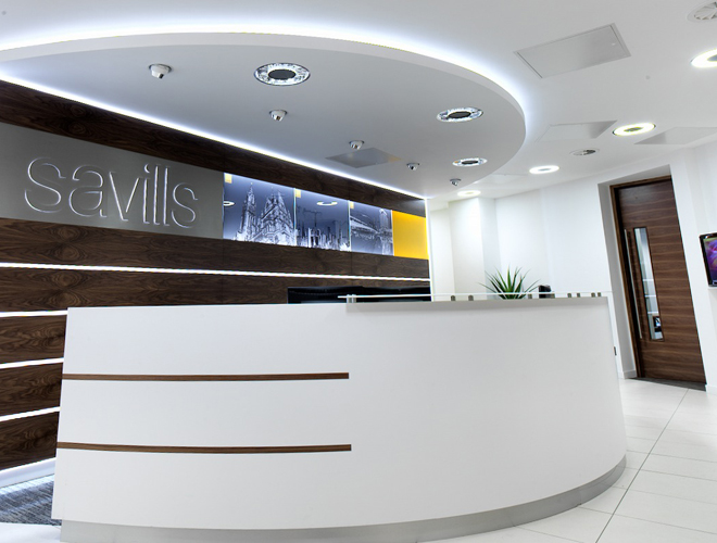 Savills Offices – Curved Corian, Walnut Inlay, Glass Shelf